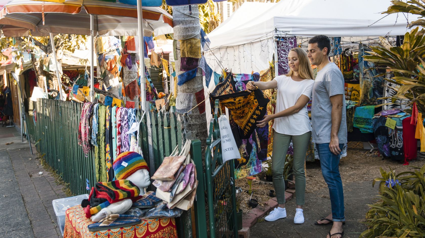 A Man And Woman Standing at Nimbin Markets